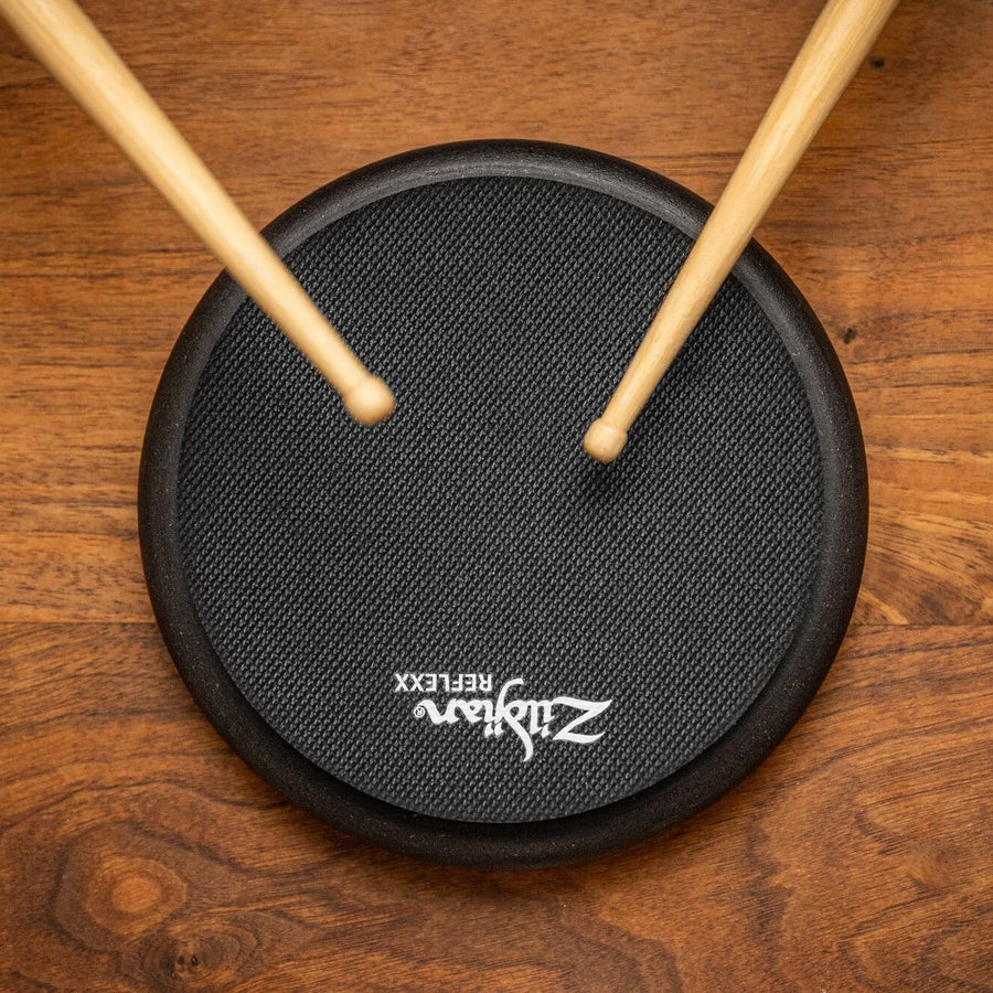 Black Zildjian Reflexx pads being played